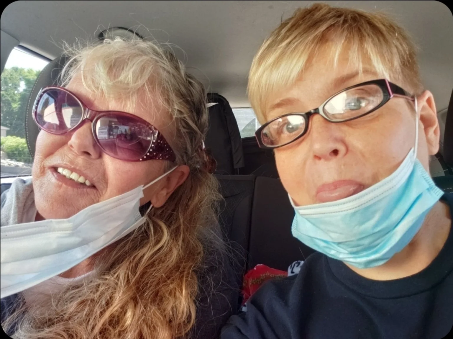 Lisa with her mom in the car